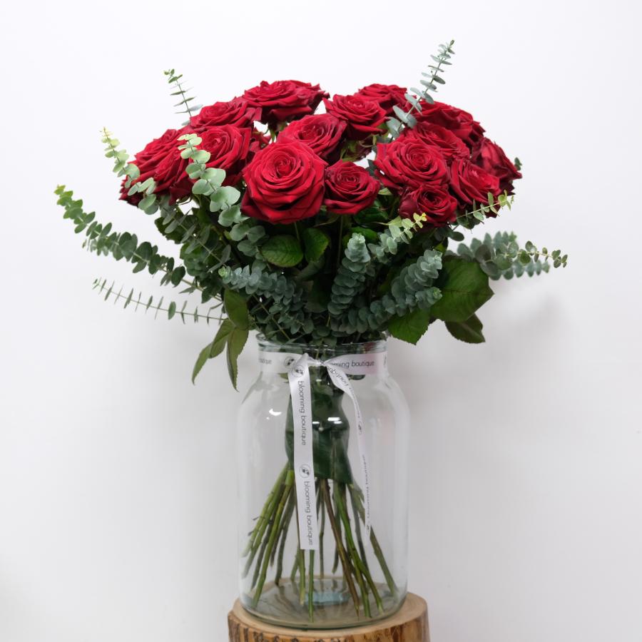 The Pure and Simple Beauty of Magnificent Velvet Red Roses. Our Deluxe Red Roses Bouquet Consists of 12 or 24 Magnificently Red Roses and Few Sprigs of Elegant Eucalyptus. Please Place Your Order by 1 pm for Same Day Flower Delivery Dublin or Next Day Flowers Delivery Ireland