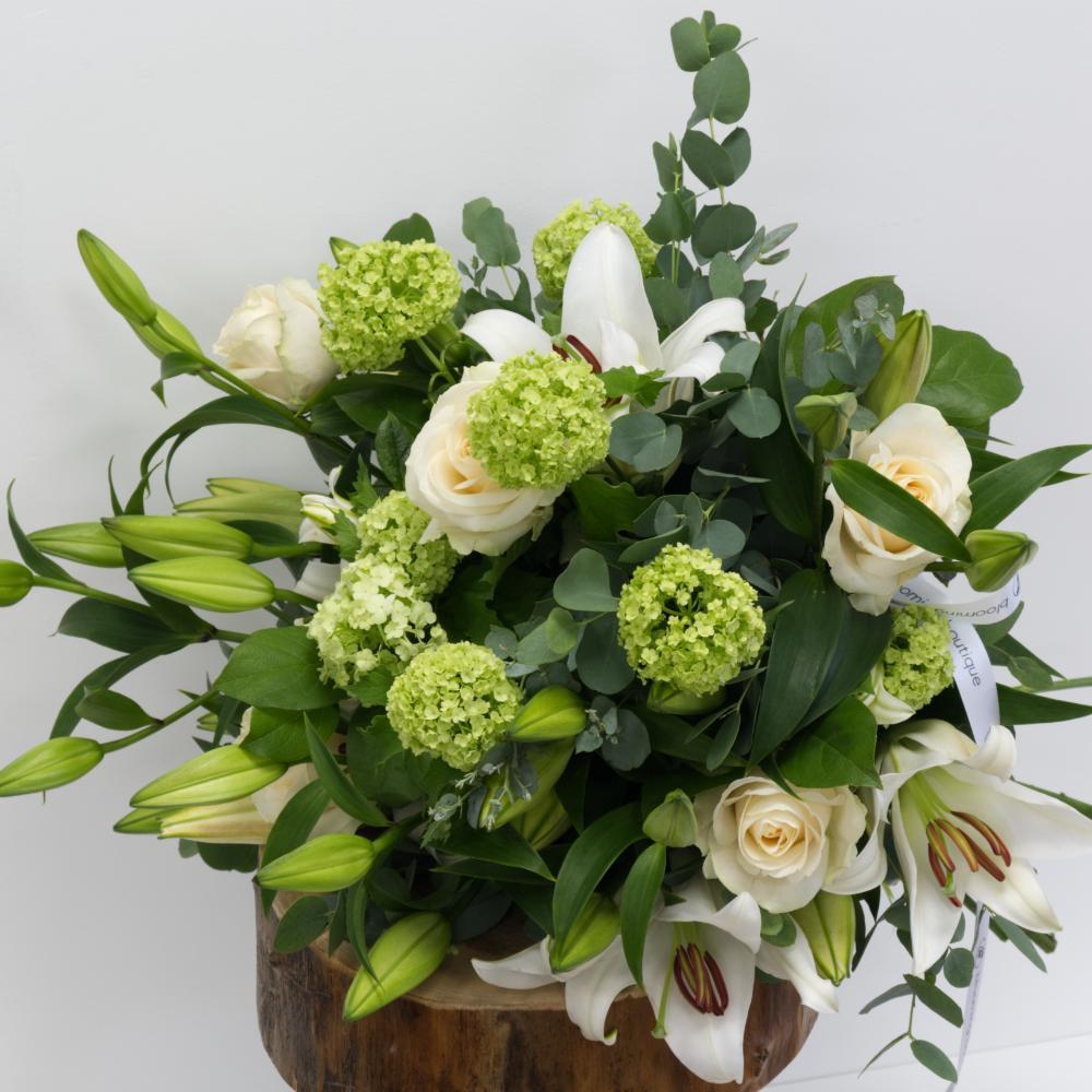 The amazing combination of pure white Lilies and Roses highlighted with a touch of Eucalyptus and Viburnum brings the complete elegance for your loved ones. Please place your order by 1 pm for Same Day Flower Delivery Dublin or Next Day Flowers Delivery Ireland