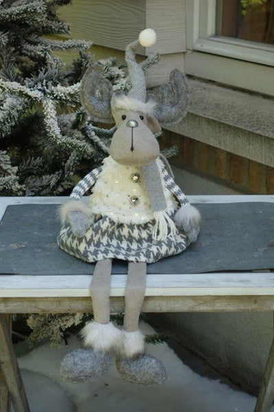 Sitting Reindeer girl with hat